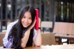 Asia Thai High School Student Uniform Beautiful Girl Read A Book Stock Photo