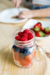 Beautiful Young Woman Preparing Breakfast At Home Stock Photo