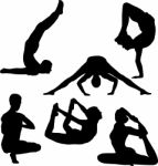 Silhouette People Doing Yoga Stock Photo