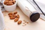 Almond Milk In Bottle With Almond Stock Photo