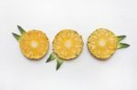 Slices Of Pineapple With Leaf Isolated Stock Photo