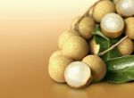 Longan On Orange Solid Background Stock Photo