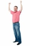 Mature Gentleman With Raised Arms Stock Photo