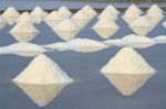 Salt Fields With Piled Up Sea Salt In Thailand Stock Photo