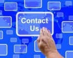 Hand Touching Contact Us Button Stock Photo