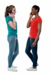 Trendy Females Speaking Over Cellphone Stock Photo