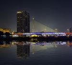 Reflection Of The Beauty Of The Chao Phraya River And Boat At Night With Rationalism At Pinklao Bridge ,bangkok Thailand Stock Photo