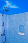 The Modern Shower Head In Restroom Isolated On Blue Sky Background Stock Photo