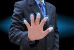 Businessman Pushing Button Stock Photo