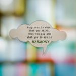 Meaningful Quote On Paper Cloud With Blurred Colorful Background Stock Photo