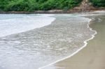 Sand Beach With Blue Ocean Stock Photo