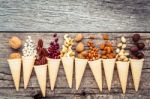 Concept For Homemade Various Nuts Ice Cream. Mixed Nuts In Waffl Stock Photo