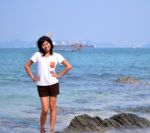 Beautiful Young Woman On Beach Stock Photo