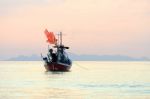 Beautiful Fishing Boat Floating With Golden Sunrise Light Backgr Stock Photo