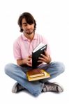 College Student Holding Books Stock Photo