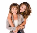 Mother Piggyback Her Daughter Stock Photo