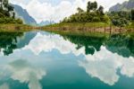 Water Surface Reflecting Sky And Cloud Stock Photo