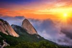 Bukhansan Mountains Is Covered By Morning Fog And Sunrise In Bukhansan National Park, Seoul In South Korea Stock Photo