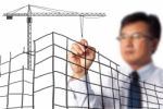 Business Man Drawing Construction Site Stock Photo