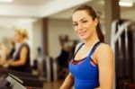 Woman Running On Treadmill Stock Photo