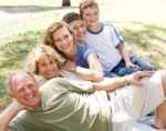 Family Laying In Line Stock Photo