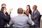 Multi Ethnic Team During Meeting Stock Photo