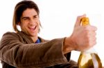 Portrait Of Man Holding Champagne Bottle Stock Photo