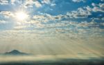 Sunlight Over Mountain Stock Photo