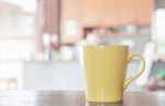 Coffee Mug In Coffee Shop Stock Photo