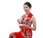 Smiling Chinese Girl Holding Cup Of Tea Stock Photo