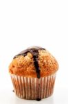 Muffin With Liquid Chocolate Stock Photo