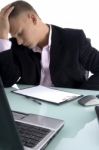 stressed Businessman in office Stock Photo