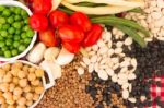 Variety Of Kitchen Ingredients With Fresh And Dried Legumes Stock Photo