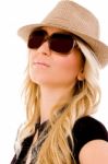 Portrait Of Smiling Woman Wearing Hat And Sunglasses Stock Photo