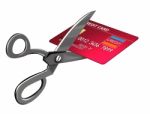 Scissors Cutting Credit Card Stock Photo