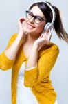 Beautiful Brunette Woman Listening To Music Stock Photo