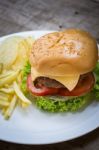 Cheeseburger With French Fried Stock Photo