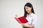 Asia Thai High School Student Uniform Beautiful Girl Read A Book Stock Photo