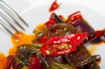 Fried Chili Pepper And Vegetable On A Wok Pan Stock Photo