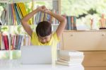 Asian Boy Doing Homework On Computer Stock Photo