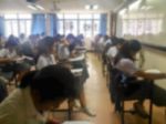 Blur Background University Students Writing Answer Doing Exam In Stock Photo