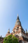 Buddha Statue And Ancient Pagoda Stock Photo