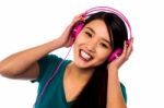 Adorable Girl Listening To Music Stock Photo