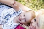 Blonde Young Mother Posing With Her Baby Stock Photo