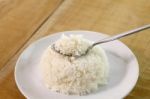 Rice On Spoon  Stock Photo