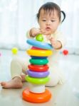 Little Asian Girl In Home Stock Photo