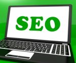 Seo On Laptop Shows Search Engine Optimization On Internet Stock Photo