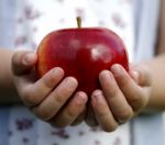 Girl Holding Apple Stock Photo