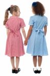 Back View Of Girls In School Uniform Stock Photo