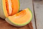 Melon Sliced ​​on Wooden Stock Photo